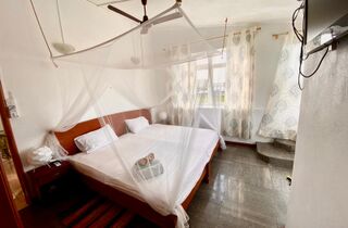 Alloggio - Surf house la Gaulette Mauritius one eye apartment guest house.jpg