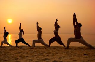 Yoga Retreat - mauritius surf holidays Yoga-Class-Beach.jpg