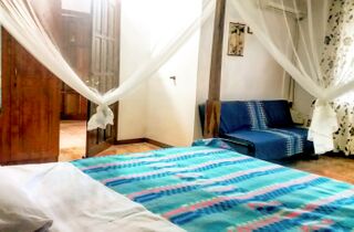 MACONDE' room 3 bed - macondè room surf house la gaulette mauritius.jpg
